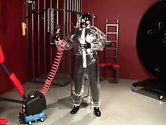 Blonde Girl In Black Latex Catsuit Full Encased In Inflatable Rubber And Full Body Plastic Suit